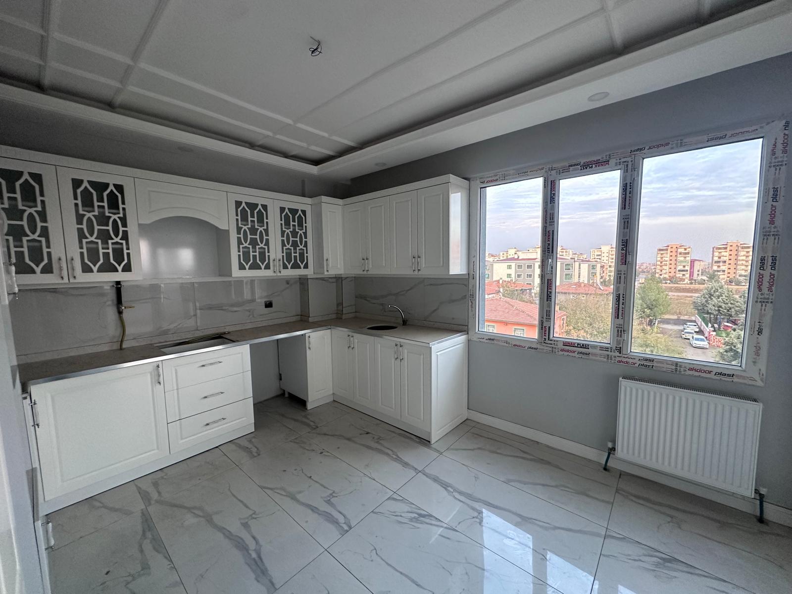 KAYA EMLAK'TAN BAĞCILARDA 1 YILLIK 3+1 SATILIK FIRSAT DAİRE